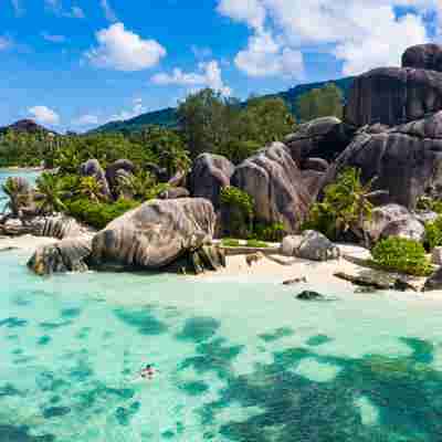 Relax on iconic granite beaches